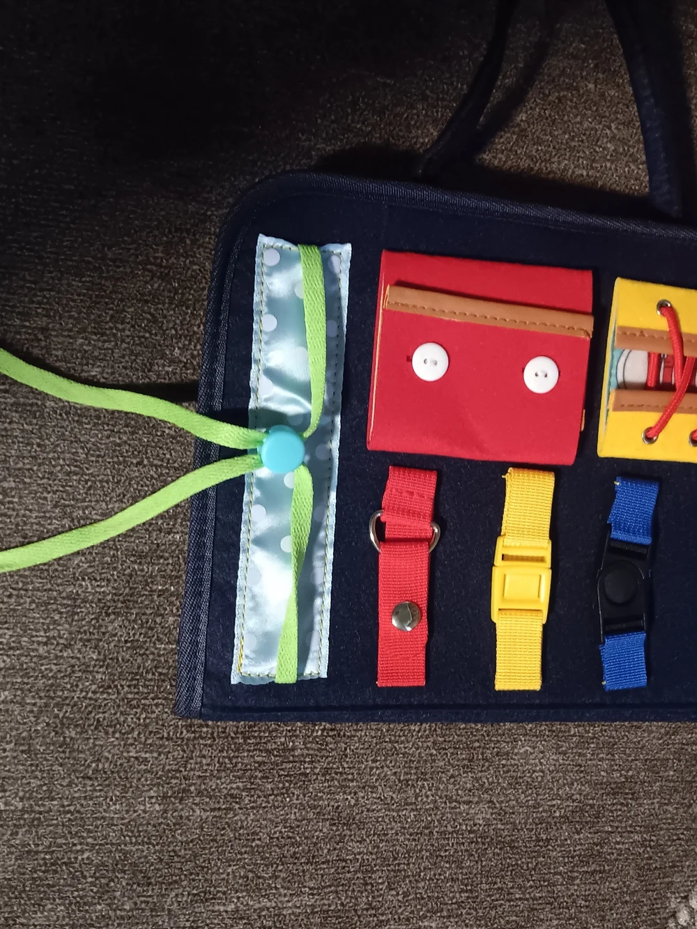 Kids Busy Board Learning Toy – Navy with Yellow, Red, Light Blue, Tan Accents